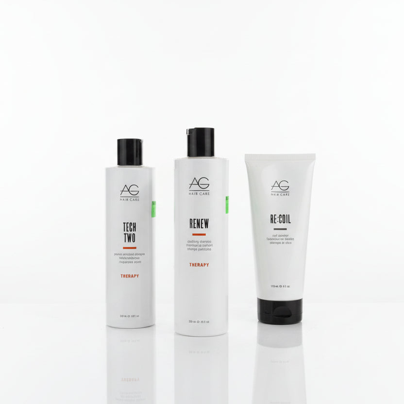 Row of AG hair care products on a store shelf