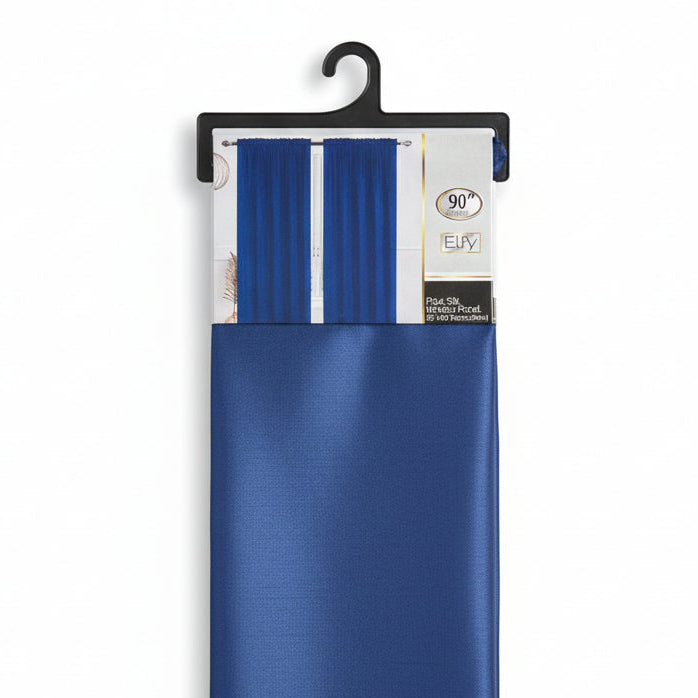 Blue fabric sample with a label on a wooden surface