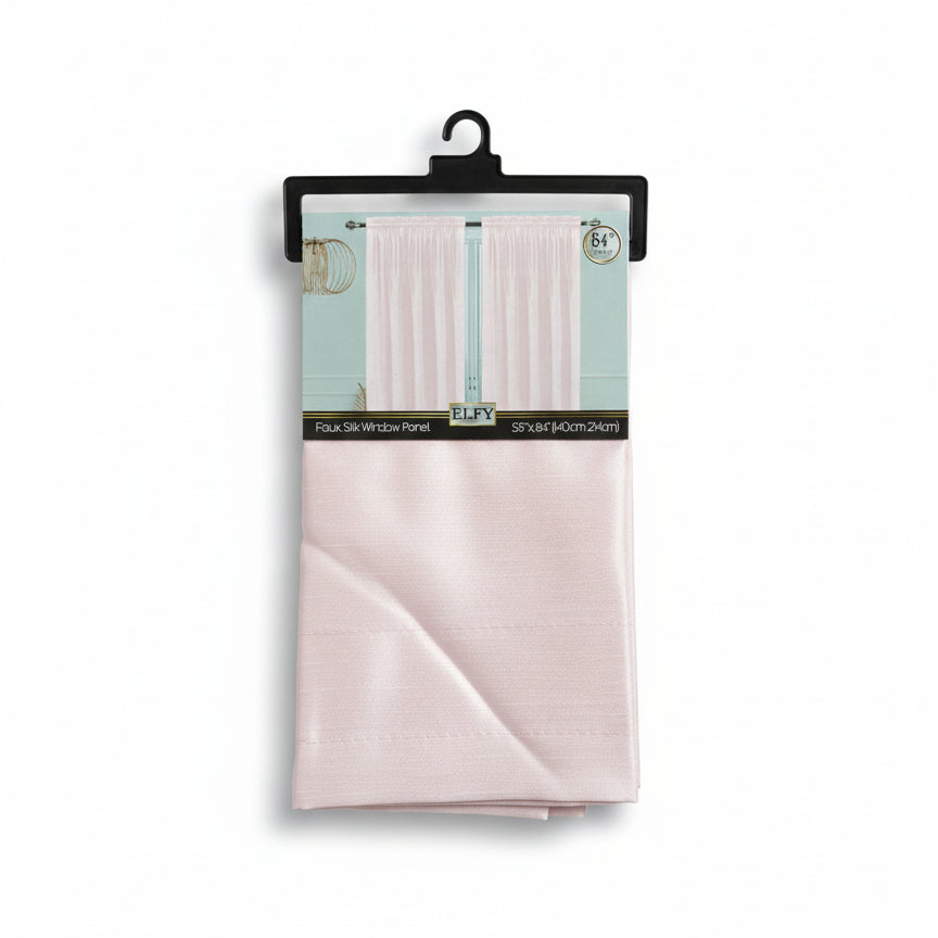 Folded fabric with a label on a wooden surface