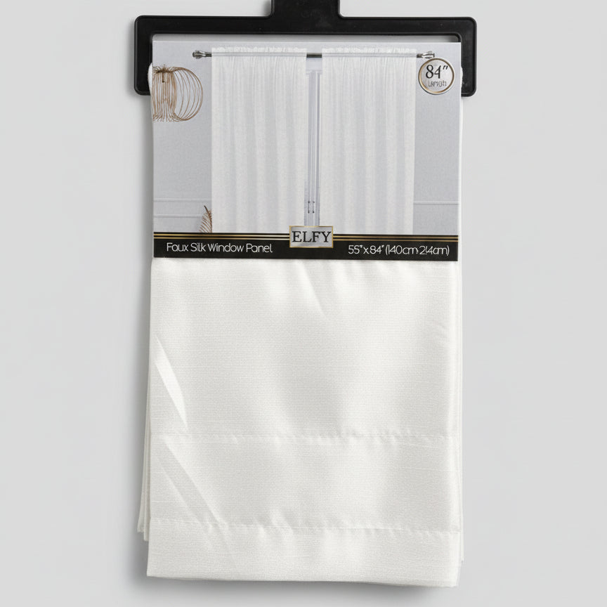 White paper bag with a label on a wooden surface