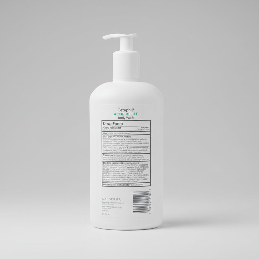 White bottle with pump on a wooden surface