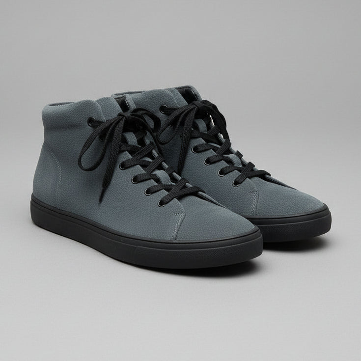 Side view of Tiger of Sweden grey suede high-top sneakers with black laces