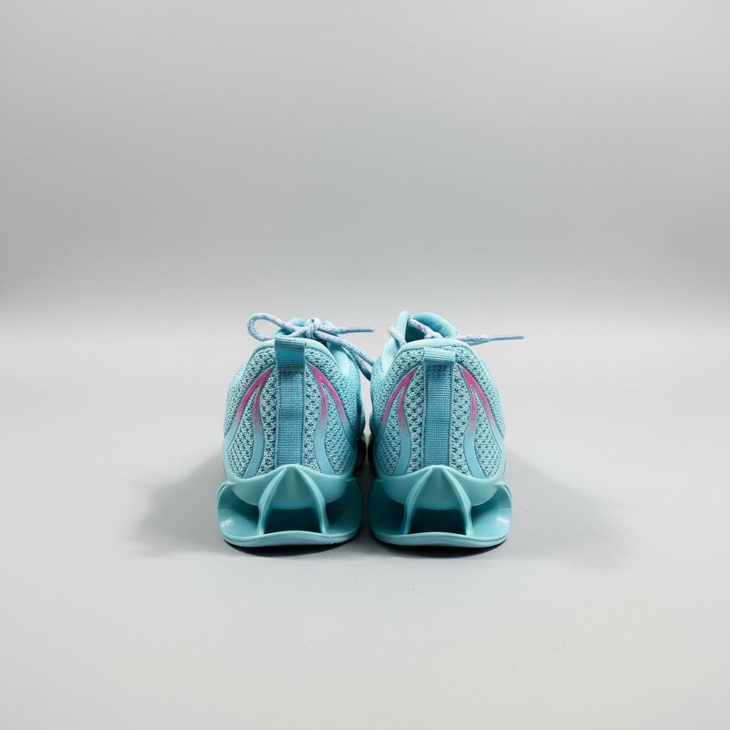 Pair of light blue sandals on a gray surface