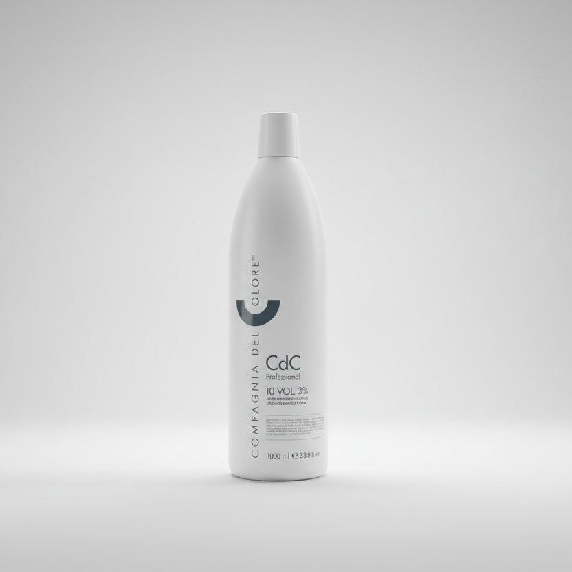 White bottle with text on a gray surface