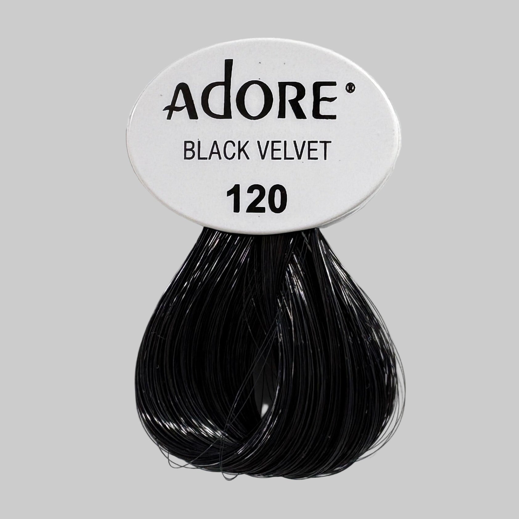 Adore Black Velvet hair color packaging on a store shelf
