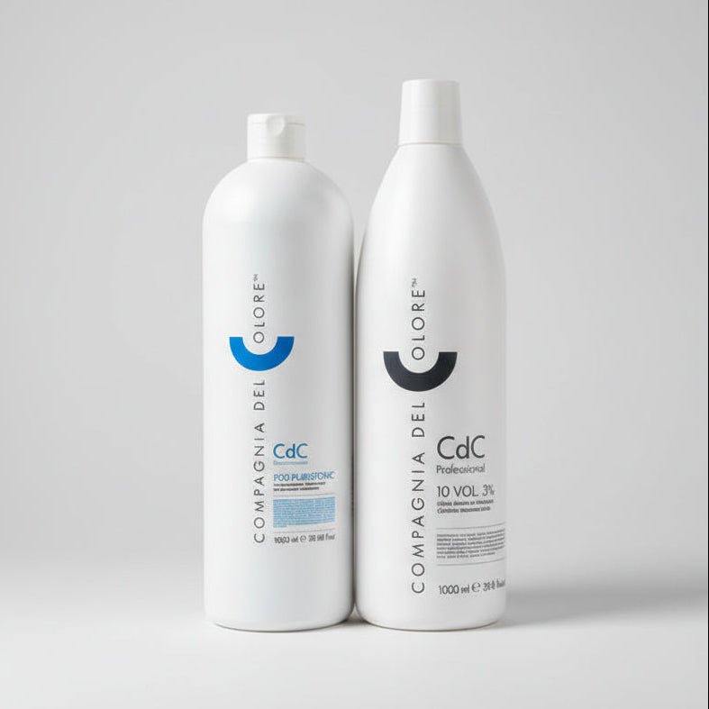 Three bottles of hair care products on a shelf with visible brand labels.