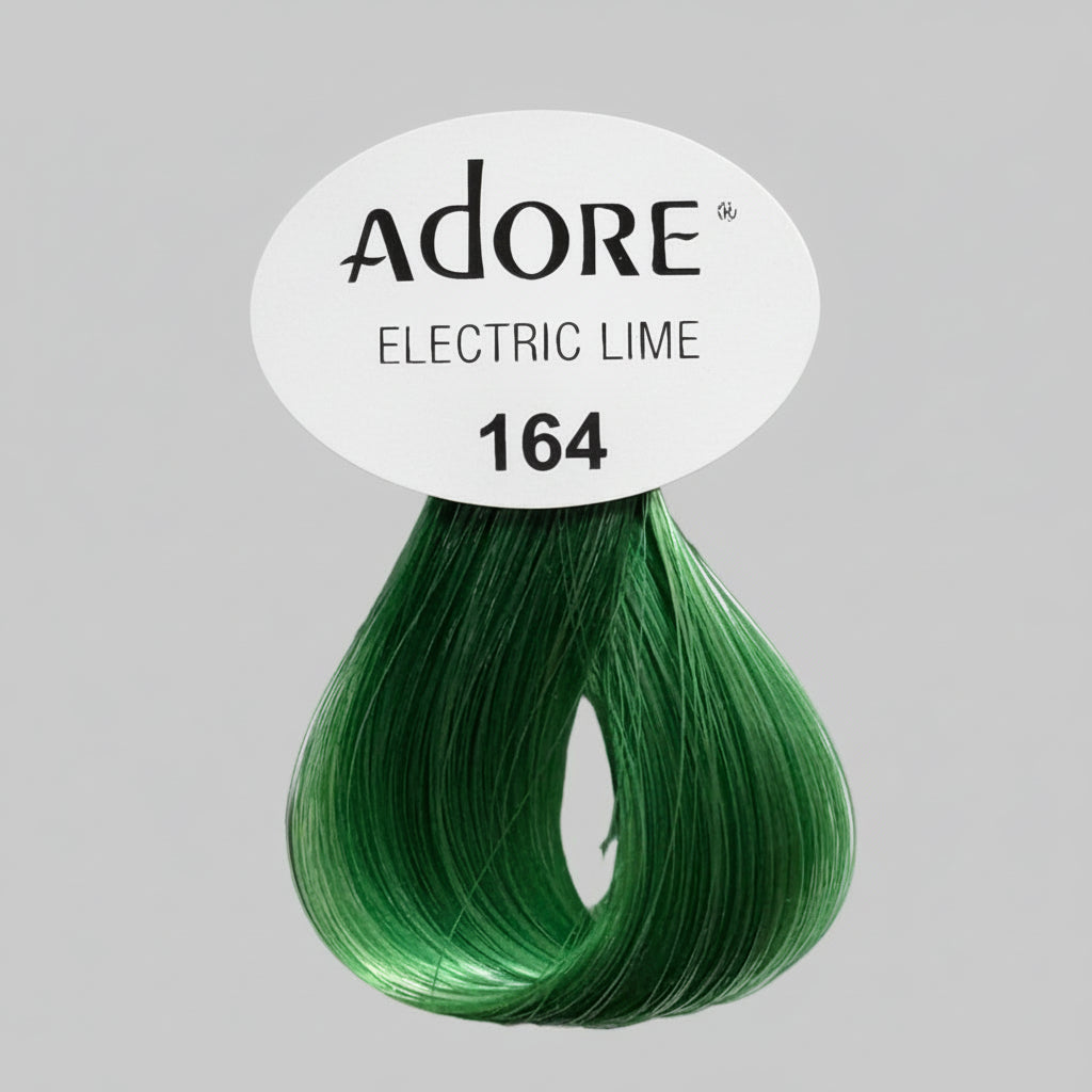 Display of hair color products including Adore and Sevich with green and blue packaging.