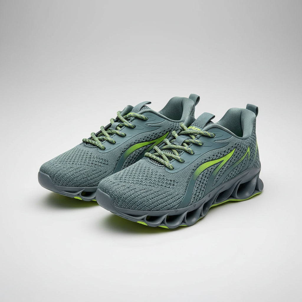 Green athletic shoe on a gray concrete surface