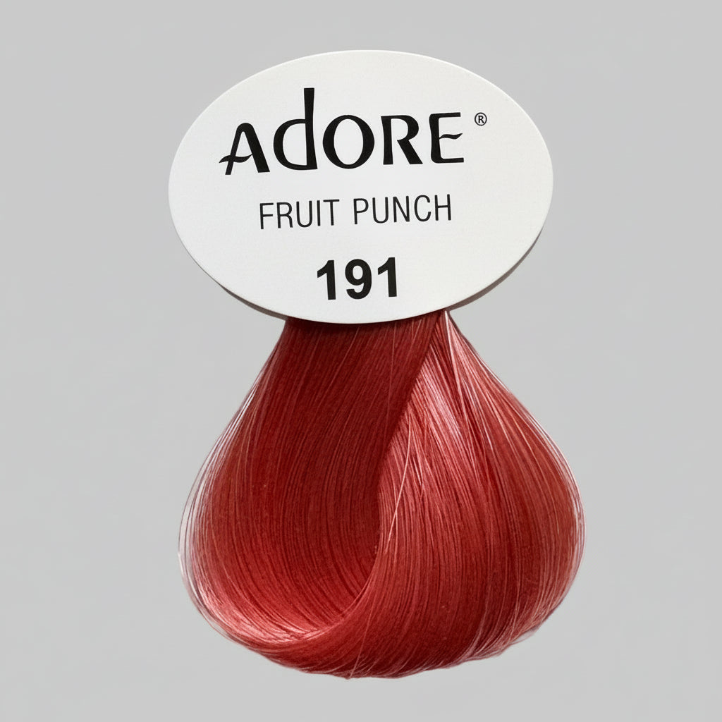 Adore hair color packaging with 'Fruit Punch' shade on a store shelf.