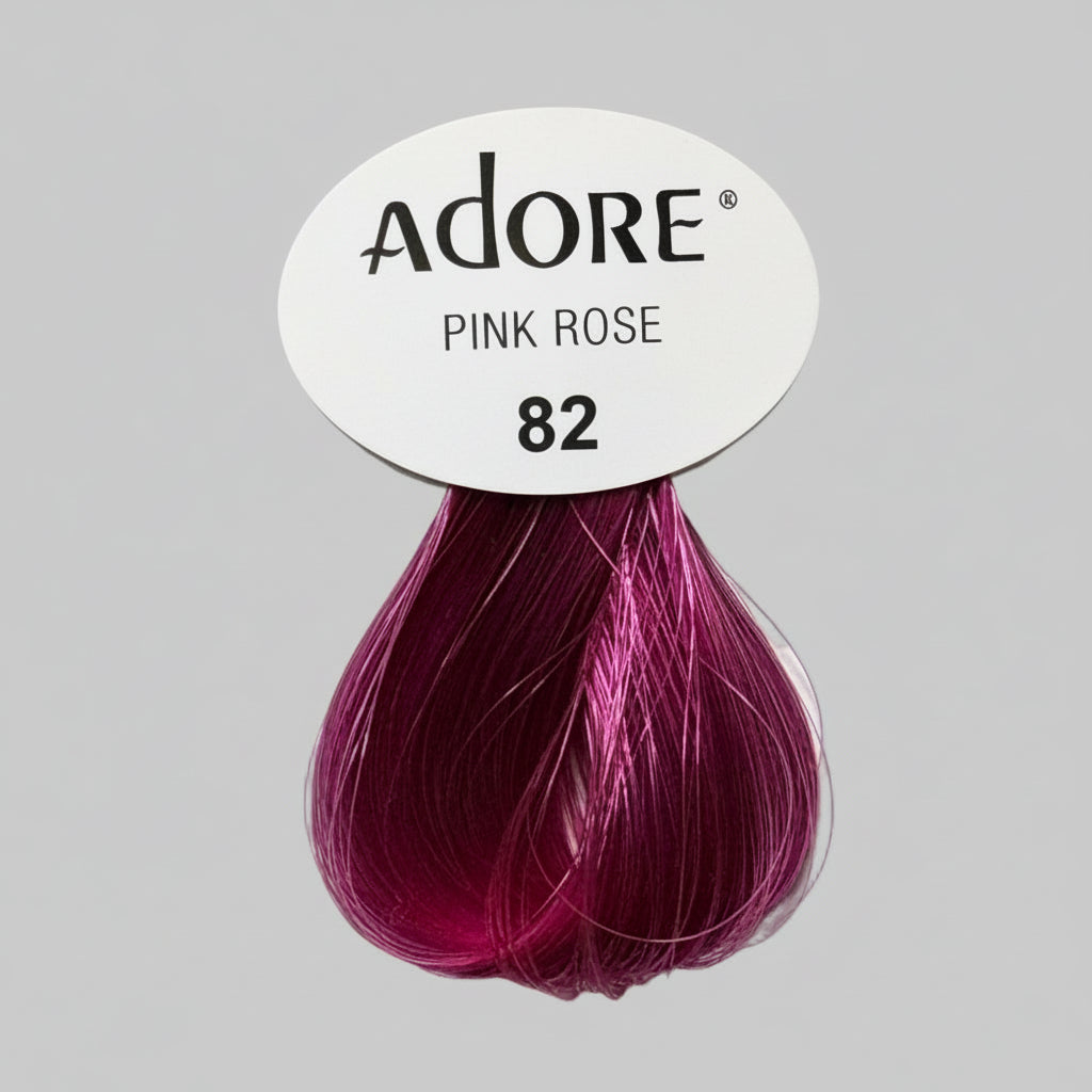Adore pink rose hair color swatch on a display with other hair color products.