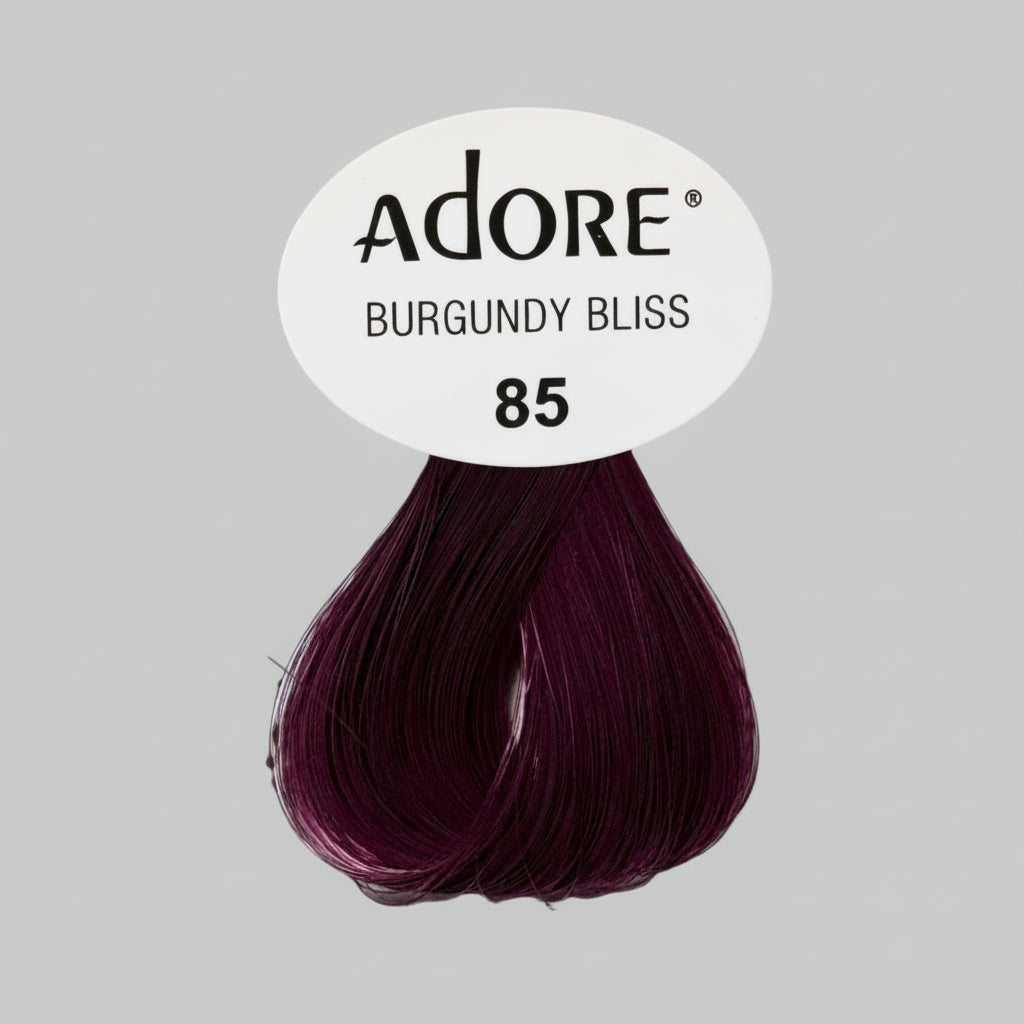 Adore Burgundy Bliss hair color package on a store shelf with other hair color products.