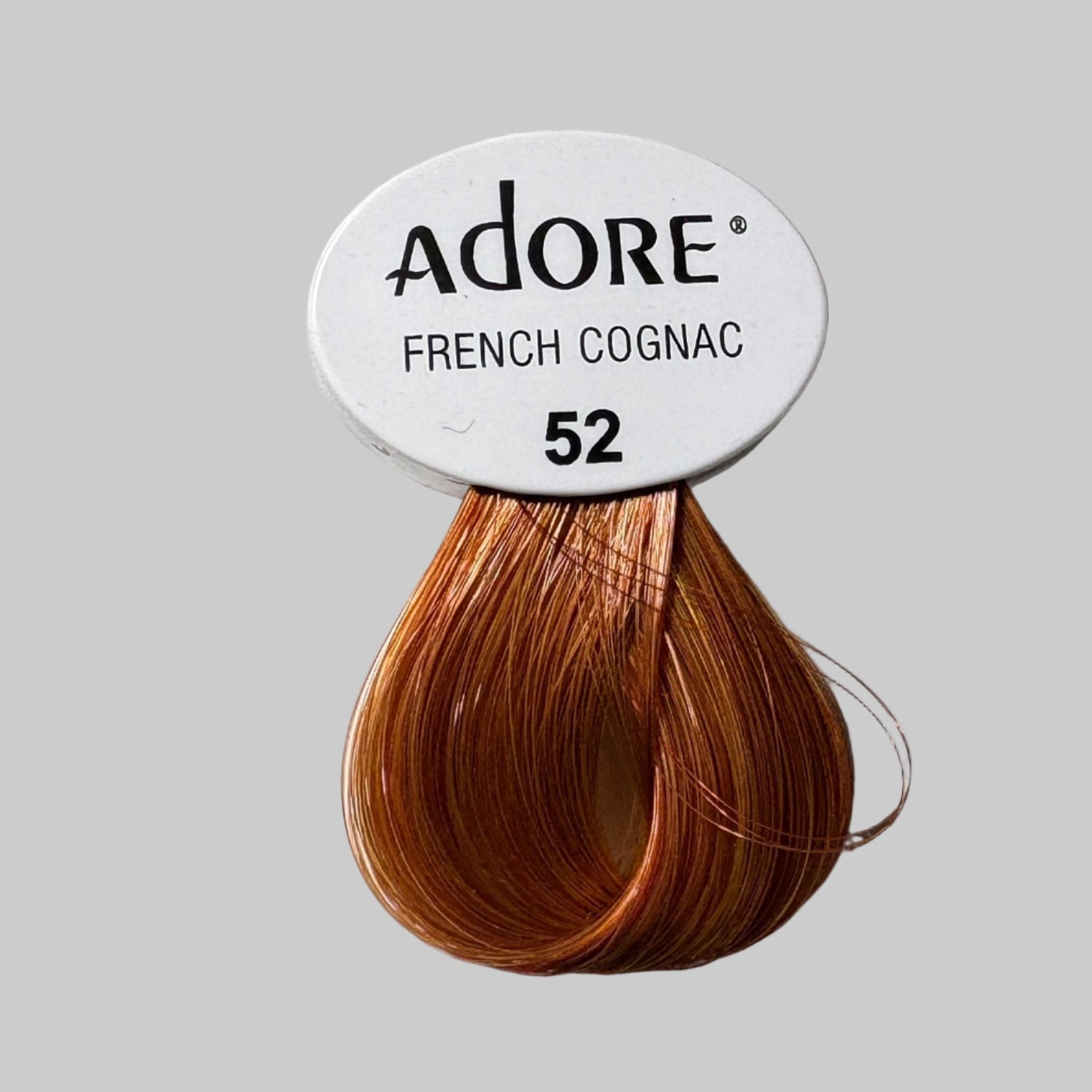 Adore hair color packaging with visible product names and numbers.