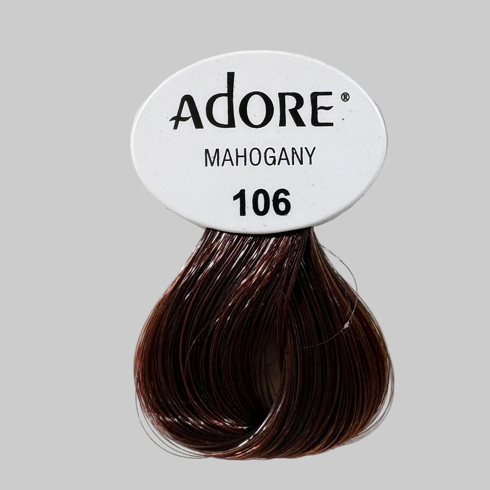 Display of Adore hair color with a focus on 'Mahogany' shade