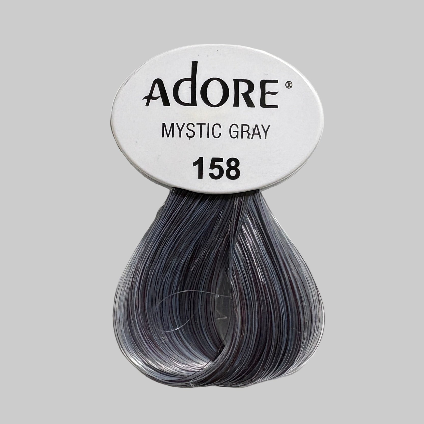 Adore semi-permanent hair color with visible branding and product details.
