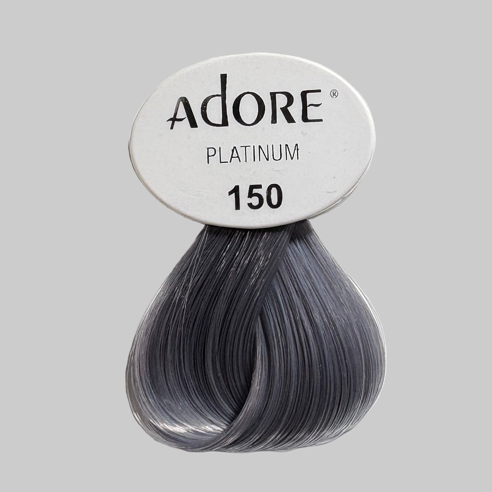 Adore hair color packaging with a focus on platinum shade 150 in a store setting.