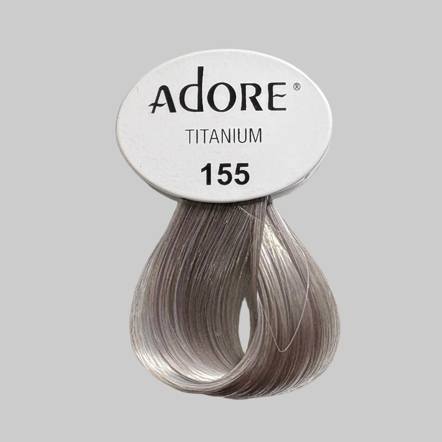 Display of Adore hair color products with visible branding and packaging.