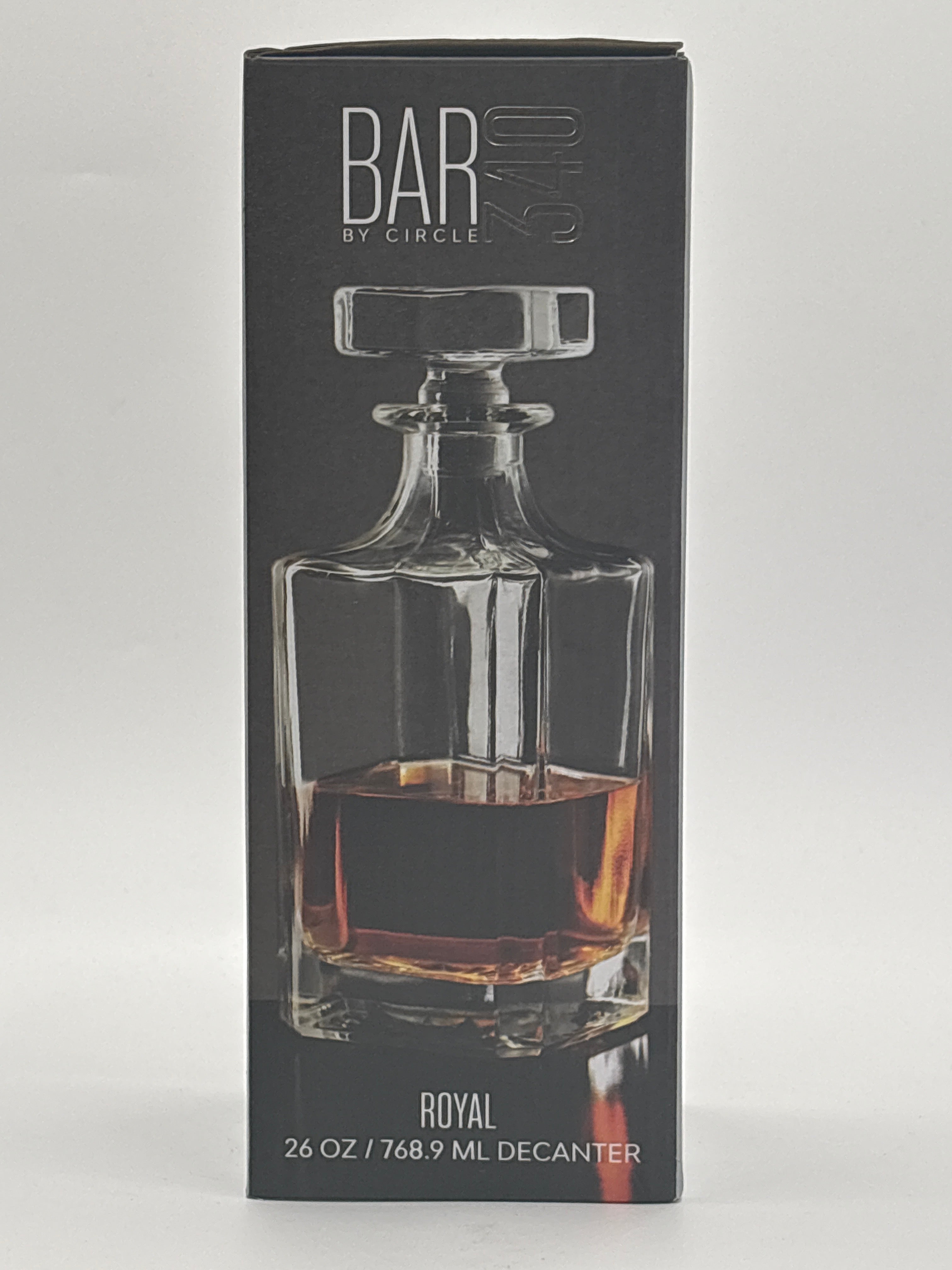 26 oz whisky decanter in clear glass with stopper filled with amber whisky by DOLLARS UNIVERSE LLC