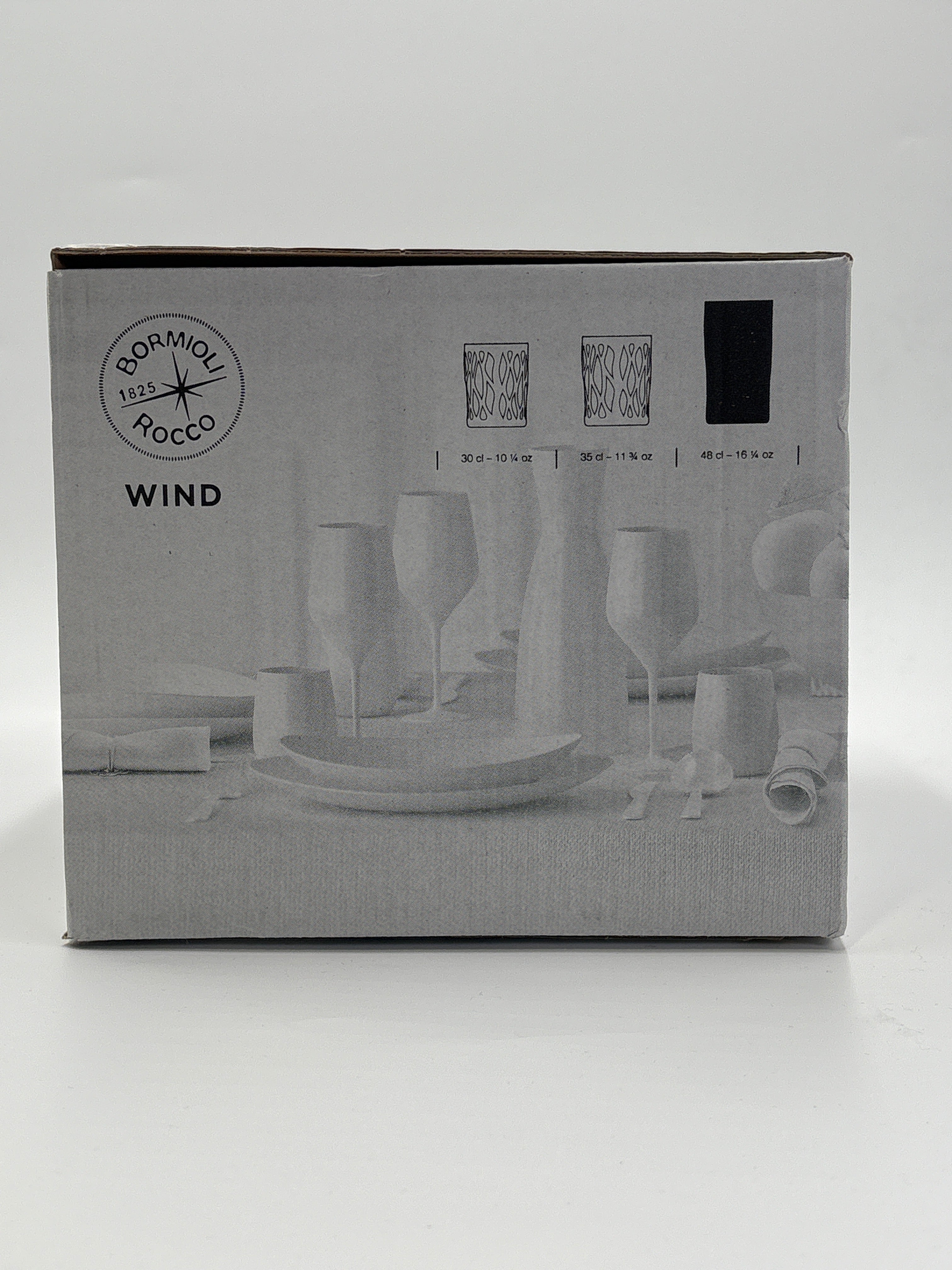 DOLLARS UNIVERSE LLC box packaging featuring 16 oz clear drinking glasses with modern design