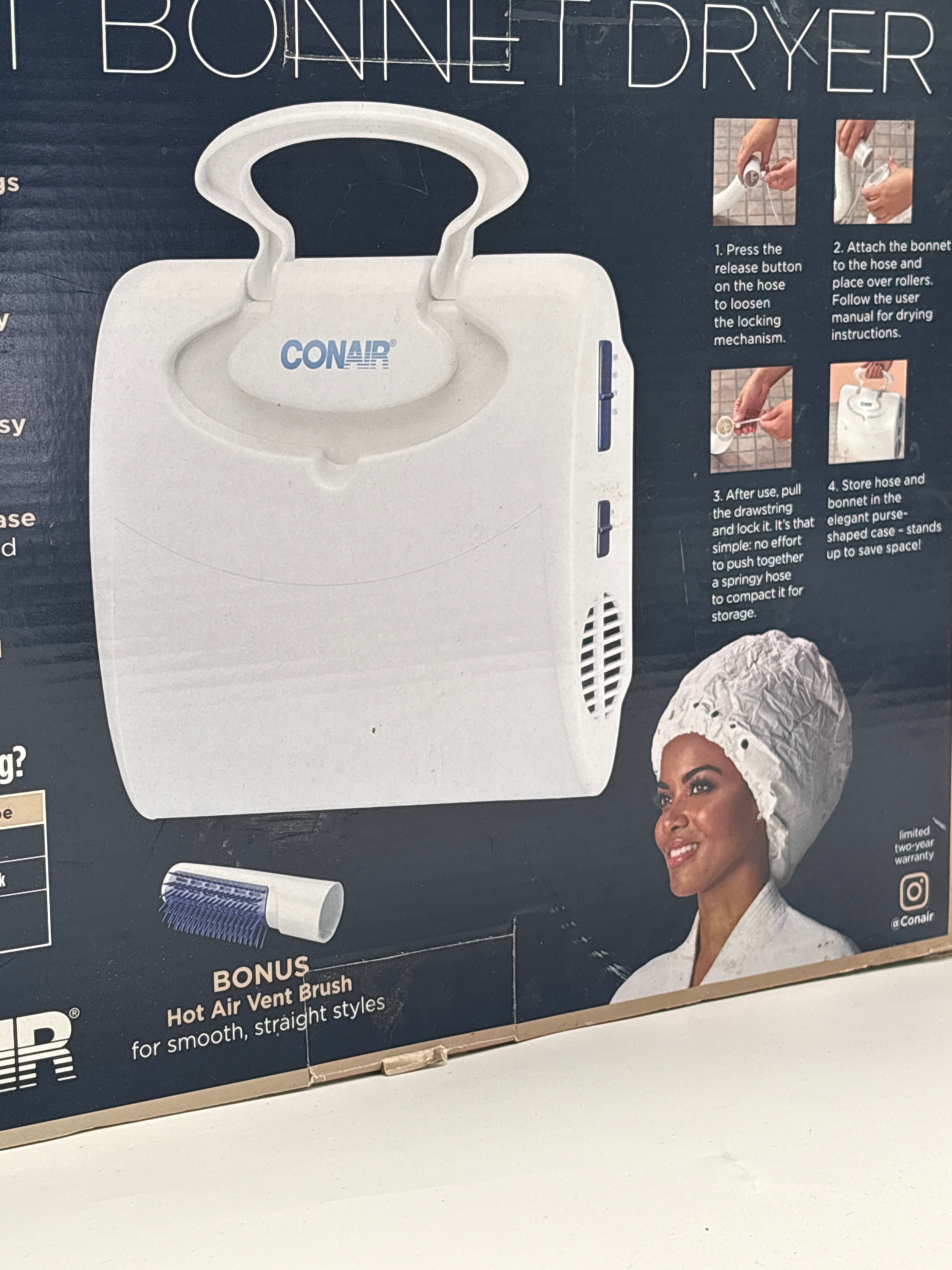 Conair soft bonnet dryer with handle and bonus hot air vent brush shown on product packaging