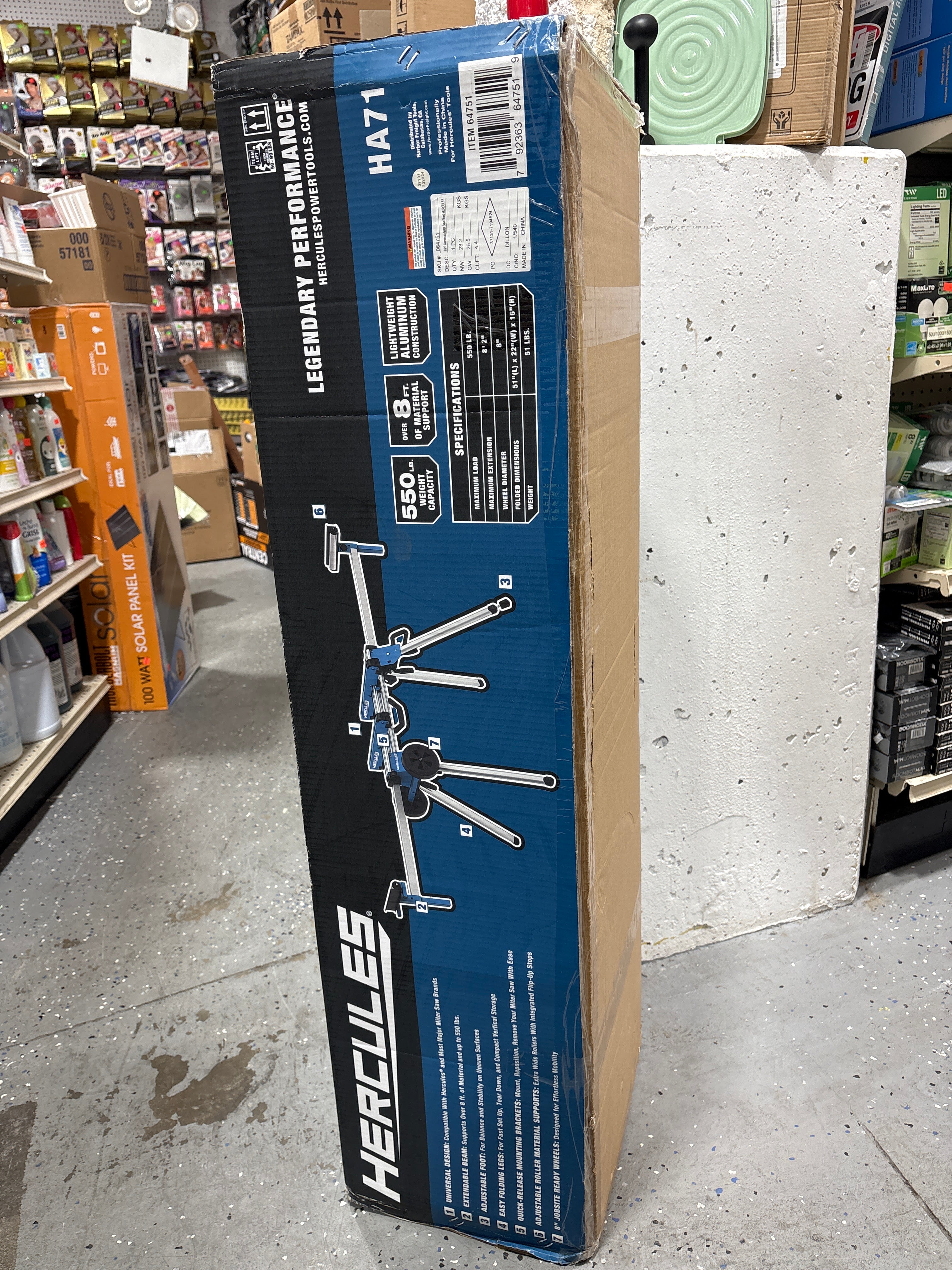 HERCULES universal desk mounting brackets boxed packaging showing product details in warehouse