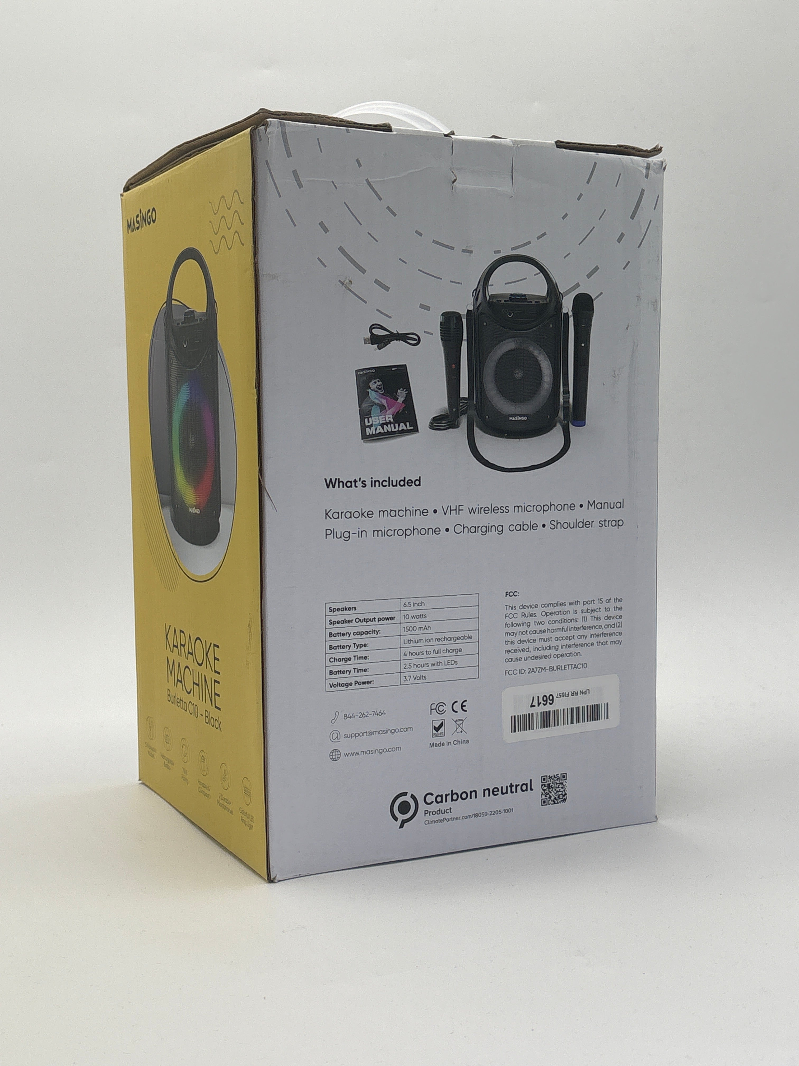 Burletta C10 karaoke machine packaging box showing included wireless microphones and accessories