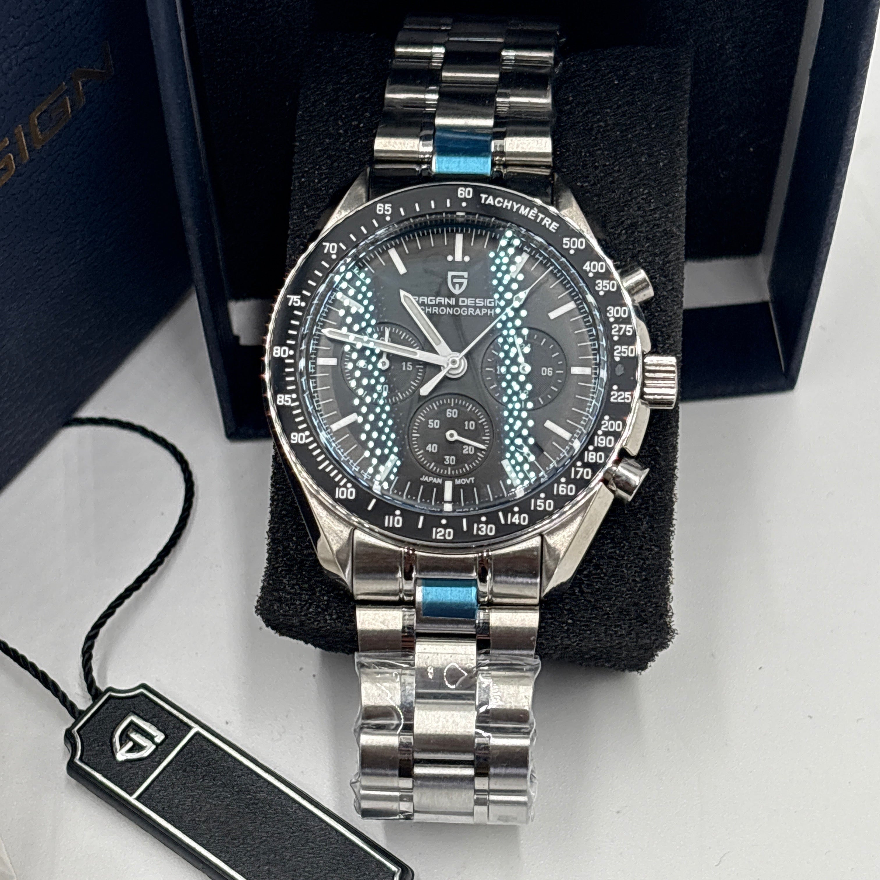 Pagani Design men’s watch with silver metal band and black chronograph dial in display box