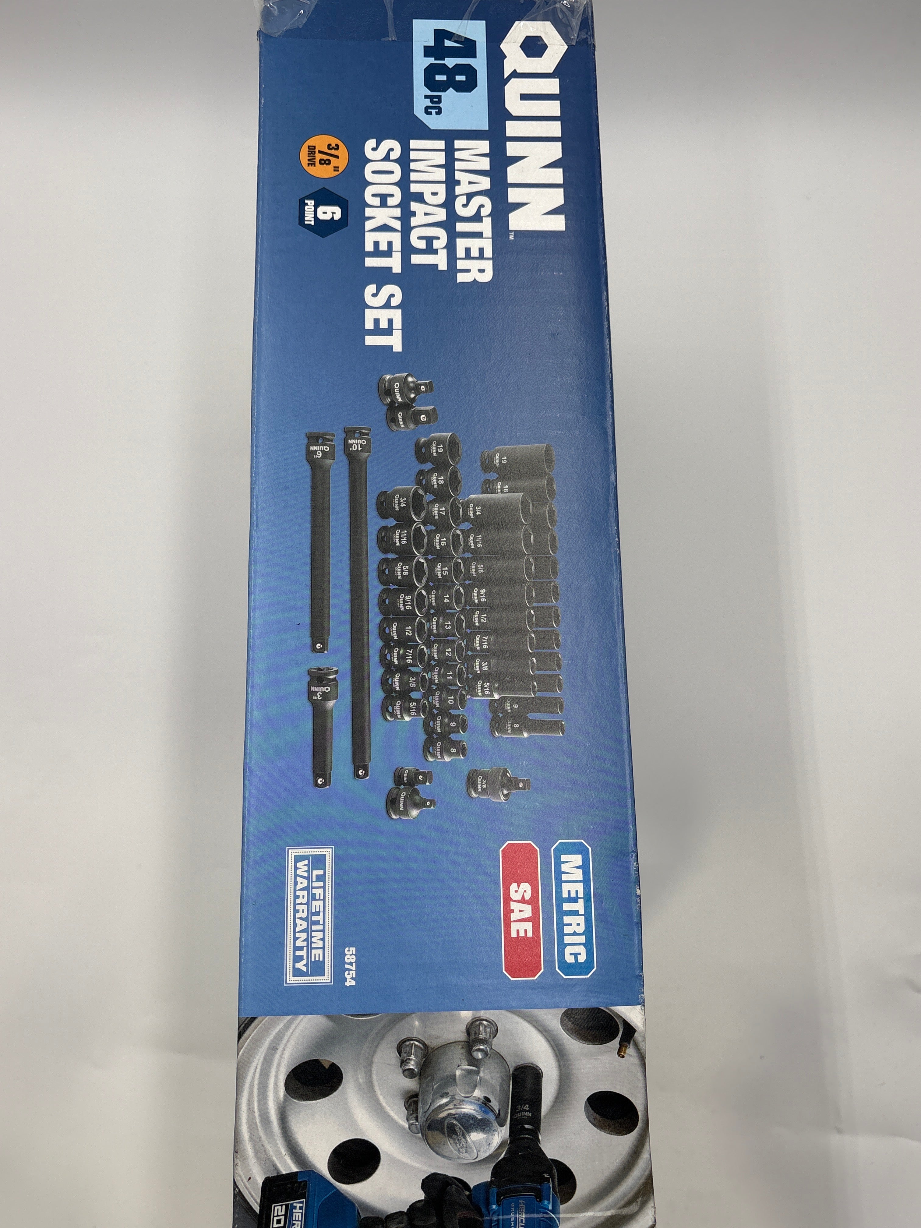 Quinn 48-piece master impact socket set with SAE and metric sockets organized in a blue box