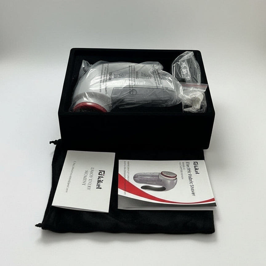 Electric razor in packaging with accessories on a white background