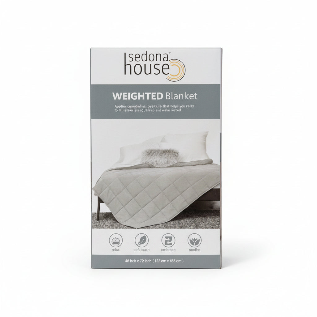 Box of Sedona House weighted blanket on a wooden floor