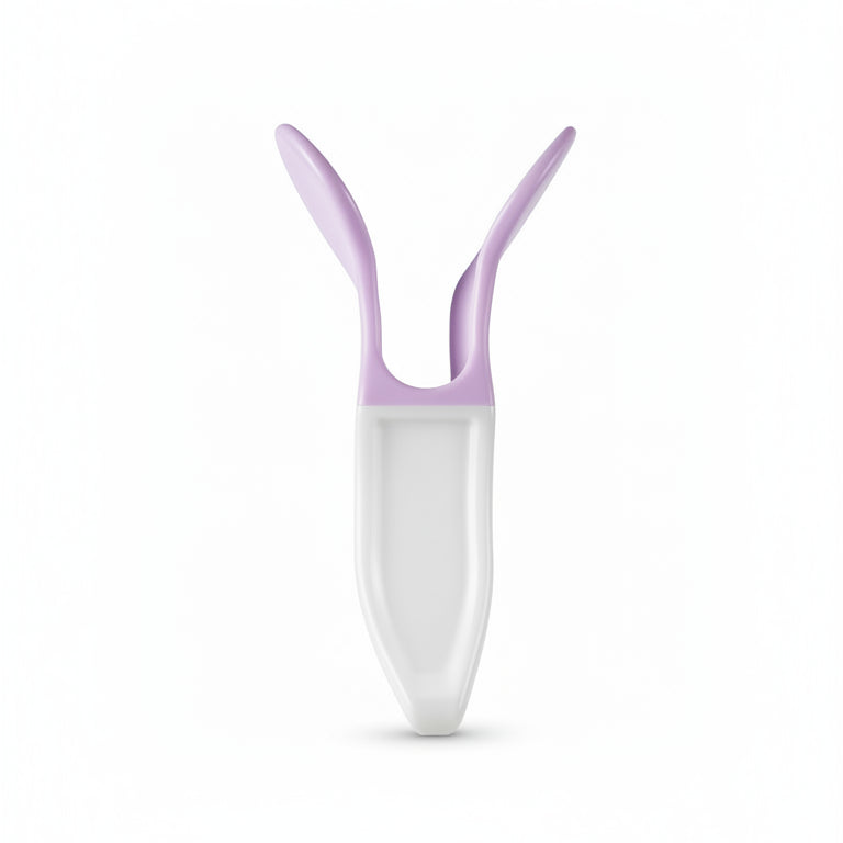 White and pink rabbit-shaped bottle opener on a beige surface