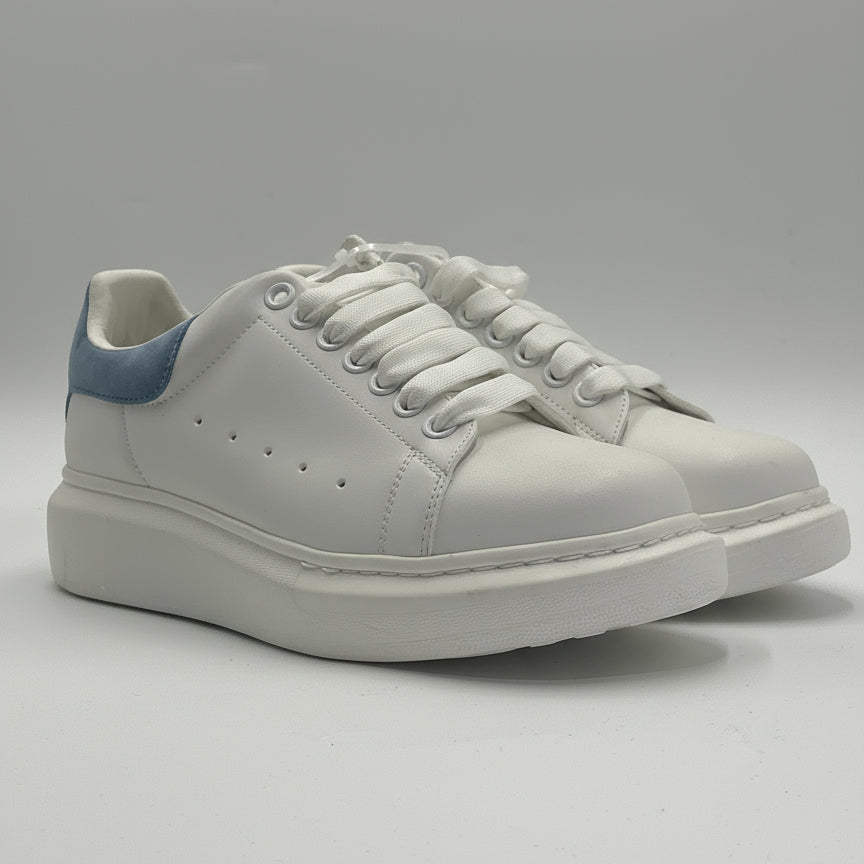 White and blue casual sneakers with thick soles and lace-up design by DOLLARS UNIVERSE LLC